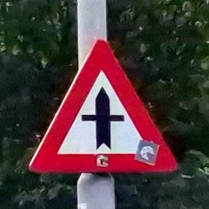 Beplakking en graffiti op verkeersbord, niveau B